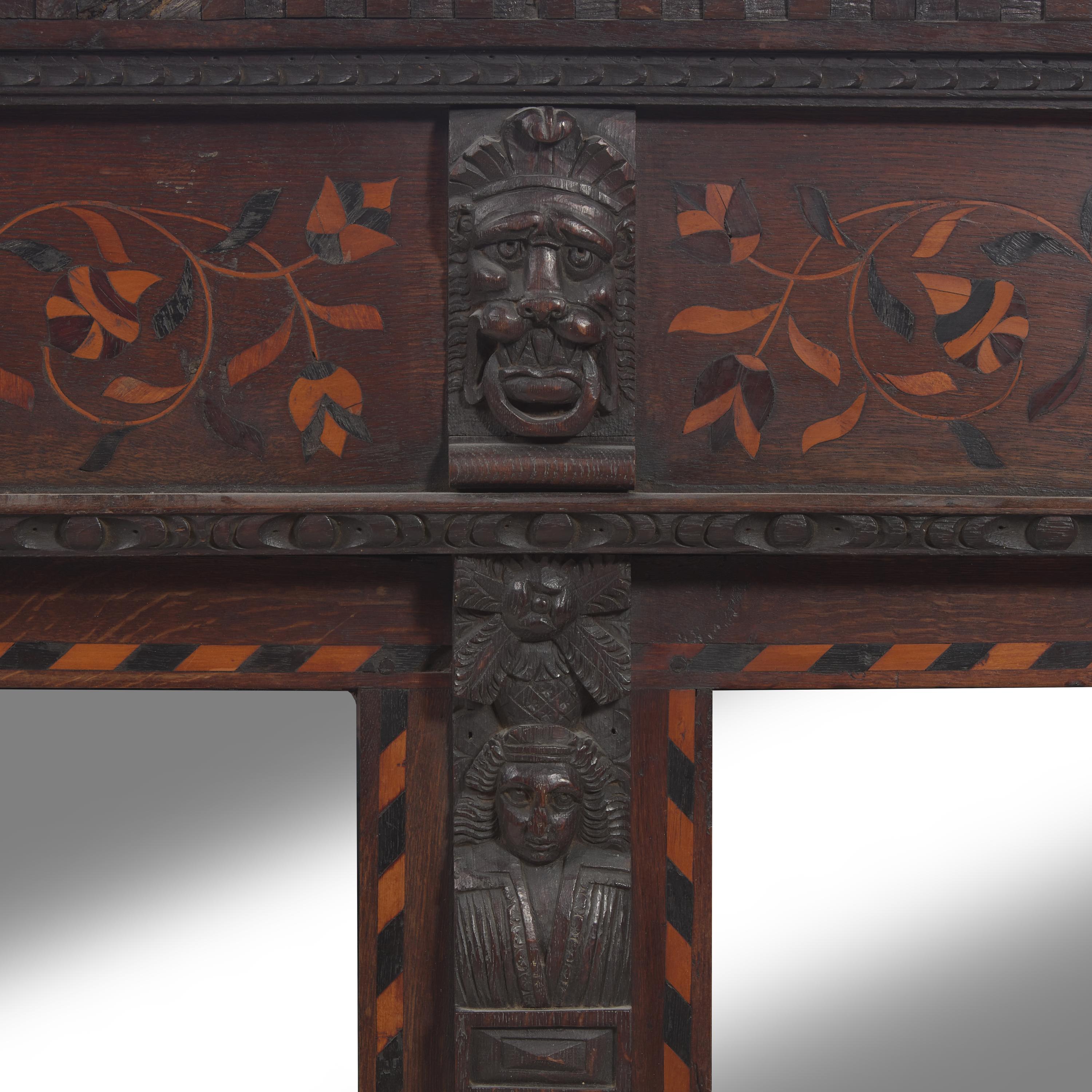 An English or Flemish Inlaid Oak Overmantel Mirror