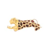 YELLOW GOLD AND GARNET LEOPARD BROOCH