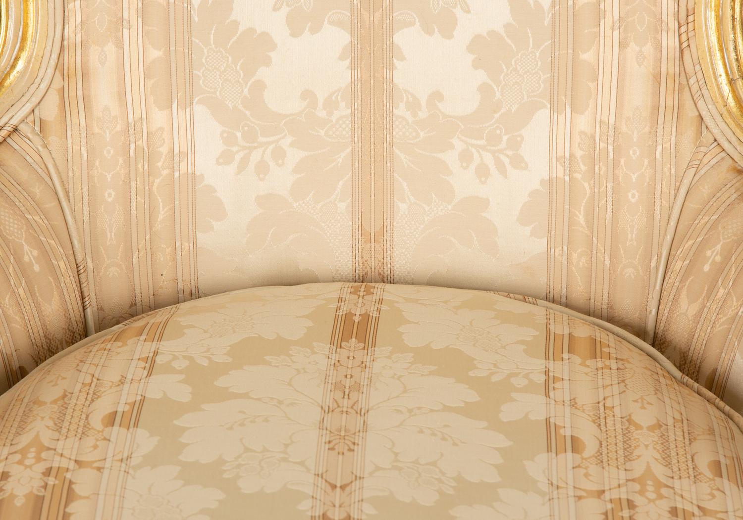 A Louis XV Style Painted and Giltwood Bergère