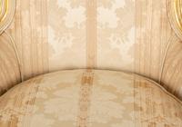 A Louis XV Style Painted and Giltwood Bergère
