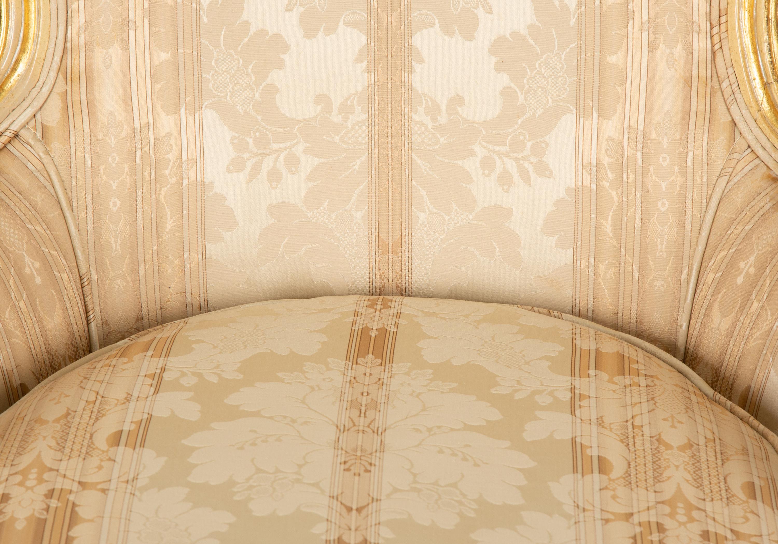 A Louis XV Style Painted and Giltwood Bergère