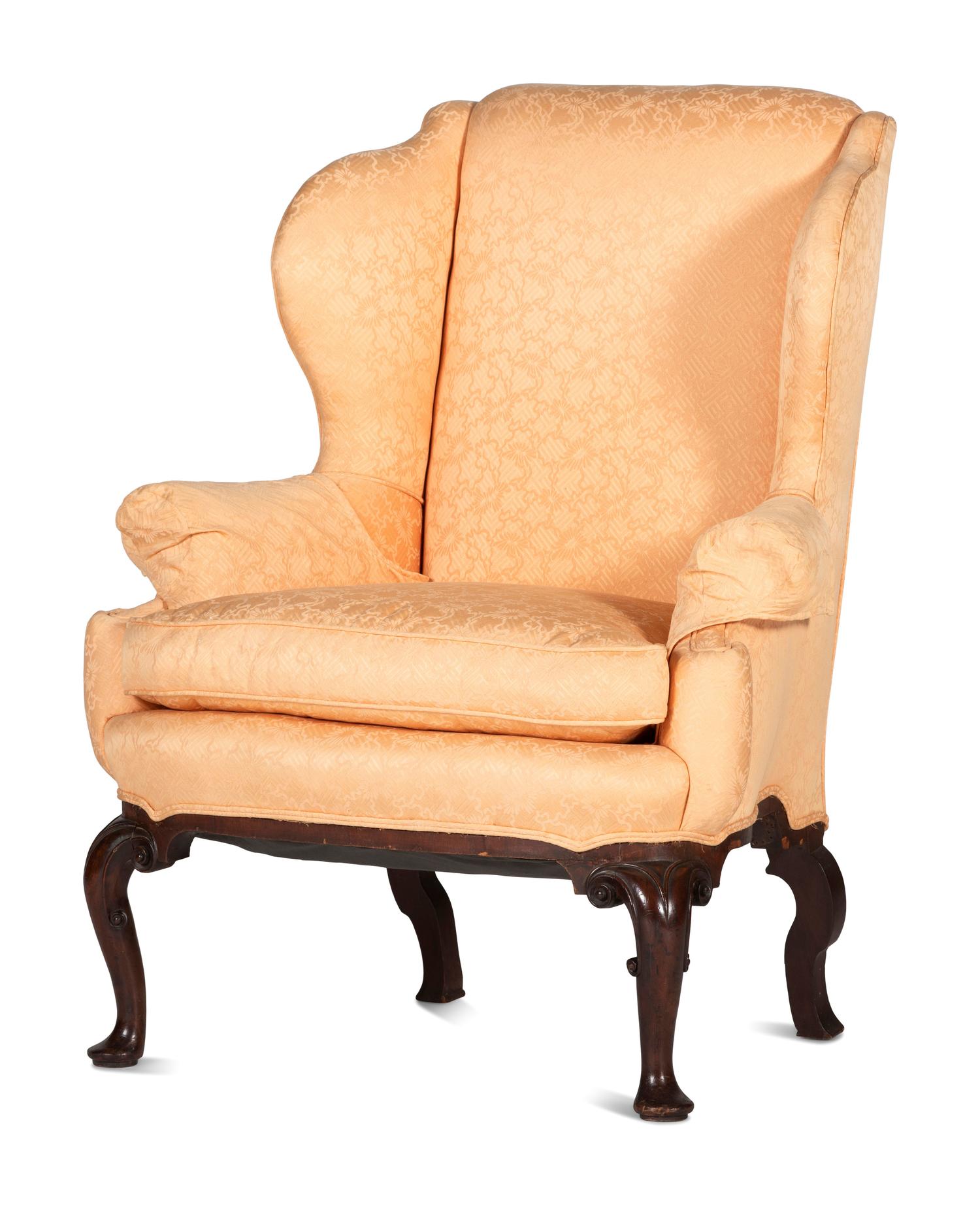 A Queen Anne Style Scroll-Carved Mahogany Easy Chair