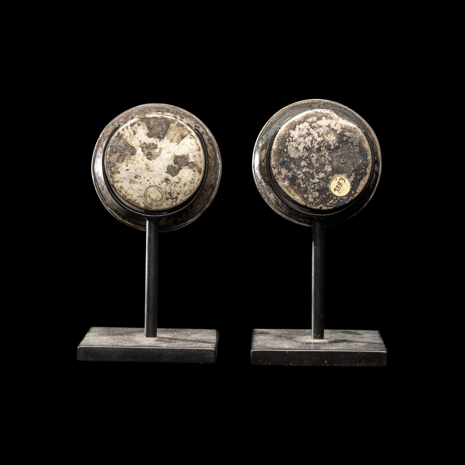 A Pair of Chimu Silver Ear Spools