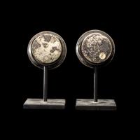 A Pair of Chimu Silver Ear Spools