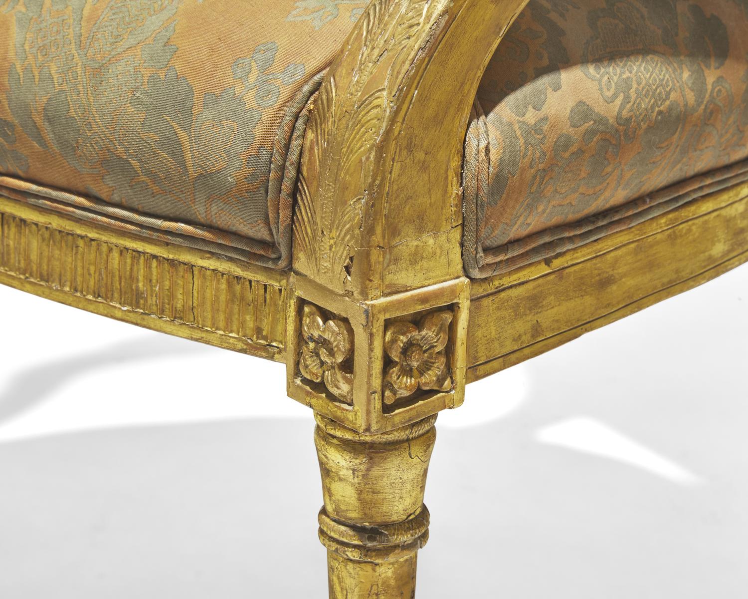 A pair of George III giltwood armchairs in the manner of John Linnell (1729-1796), circa 1790