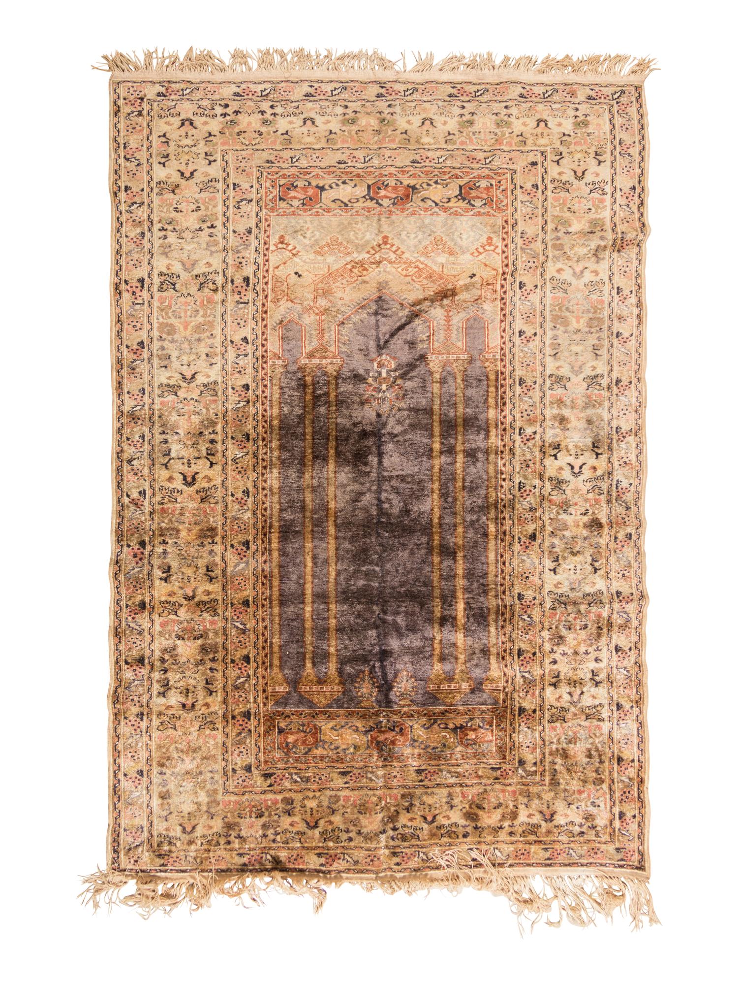 A Turkish Silk Prayer Rug