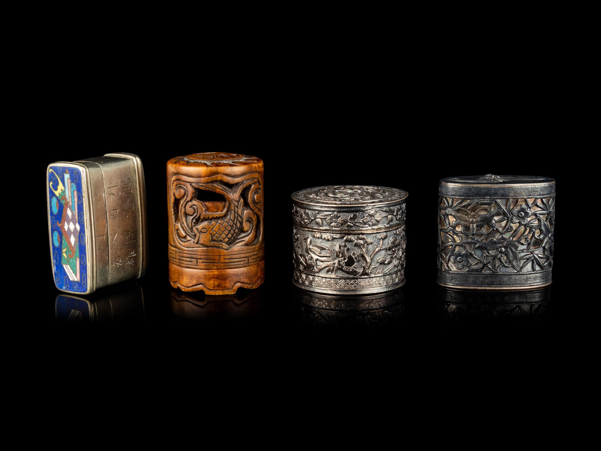 Four Chinese Covered Boxes and A Silvered Metal Mounted Bamboo Opium Pipe