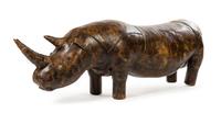 A Leather-Clad Rhinoceros Footstool Height 24 x width 77 x depth 15 inches. — DIMITRI OMERSA FOR ABERCROMBIE & FITCH, CIRCA 1960s