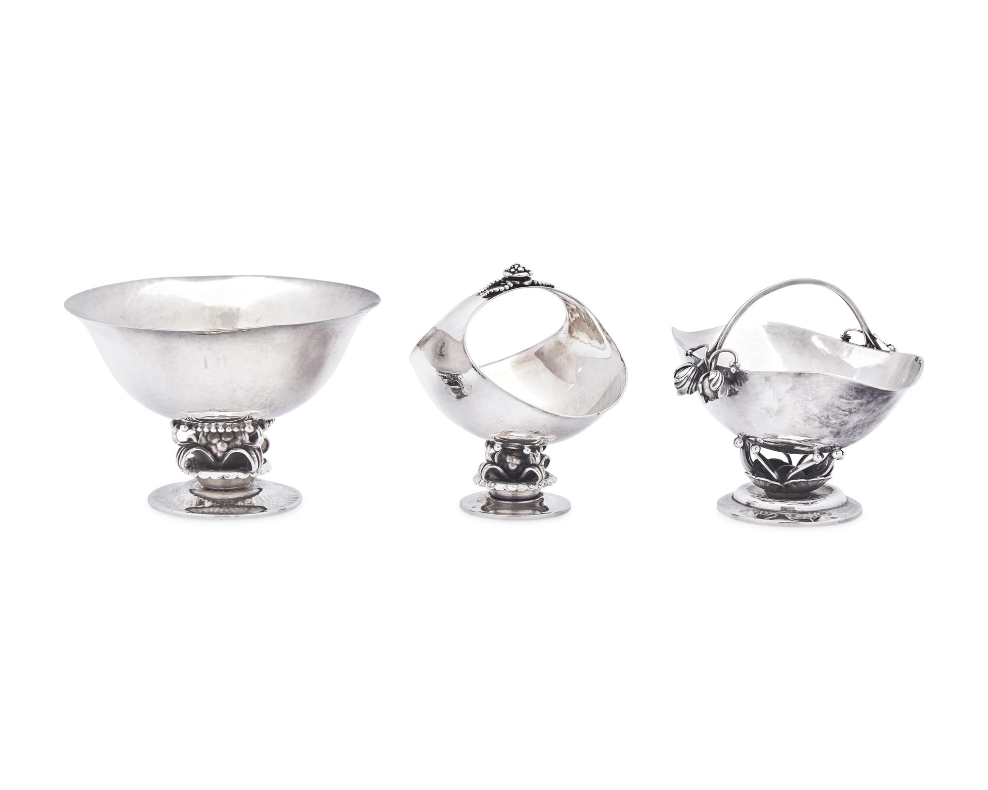 A Georg Jensen Silver Bowl and Two Sugar Baskets