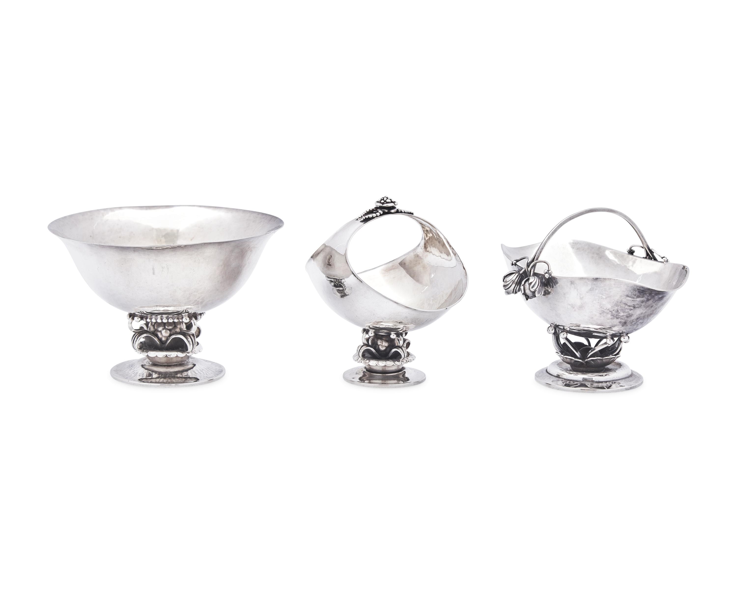 A Georg Jensen Silver Bowl and Two Sugar Baskets