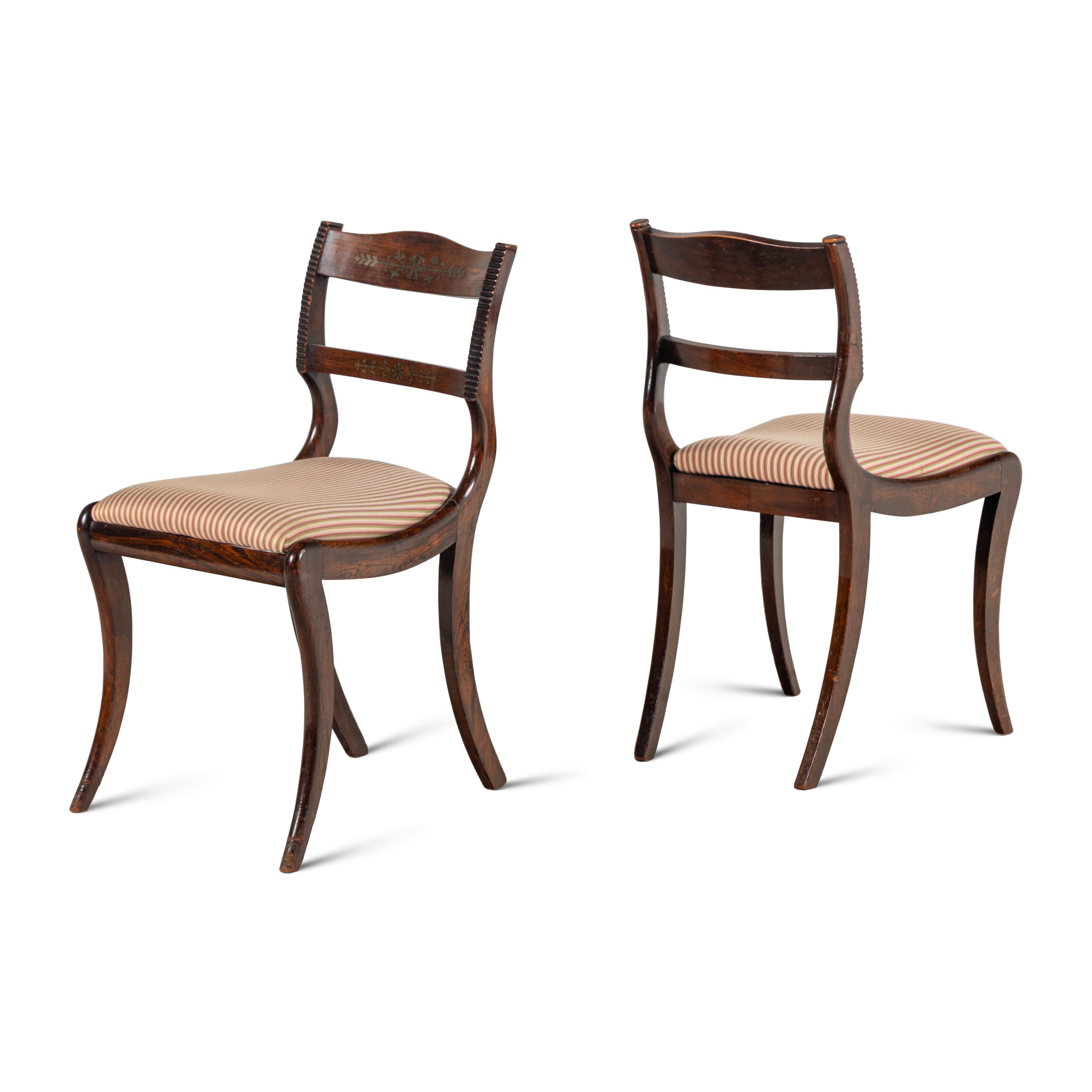 A Set of Eight Regency Brass Inlaid Mahogany Dining Chairs