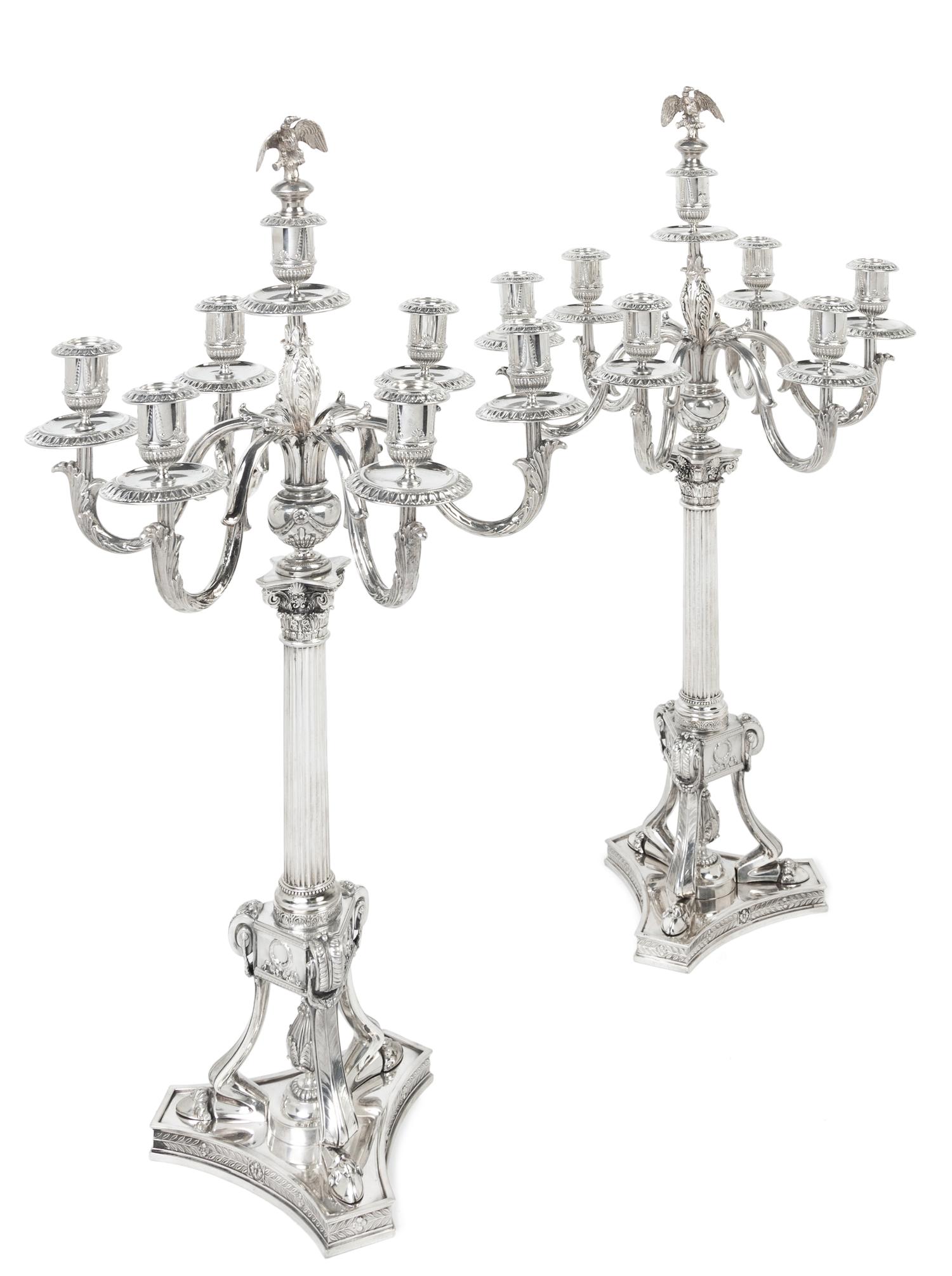 A Pair of German Silver Seven-Light Candelabra, Josef Krischer Nachfolger, Dusseldorf, Early 20th Century, the fluted columnar standard