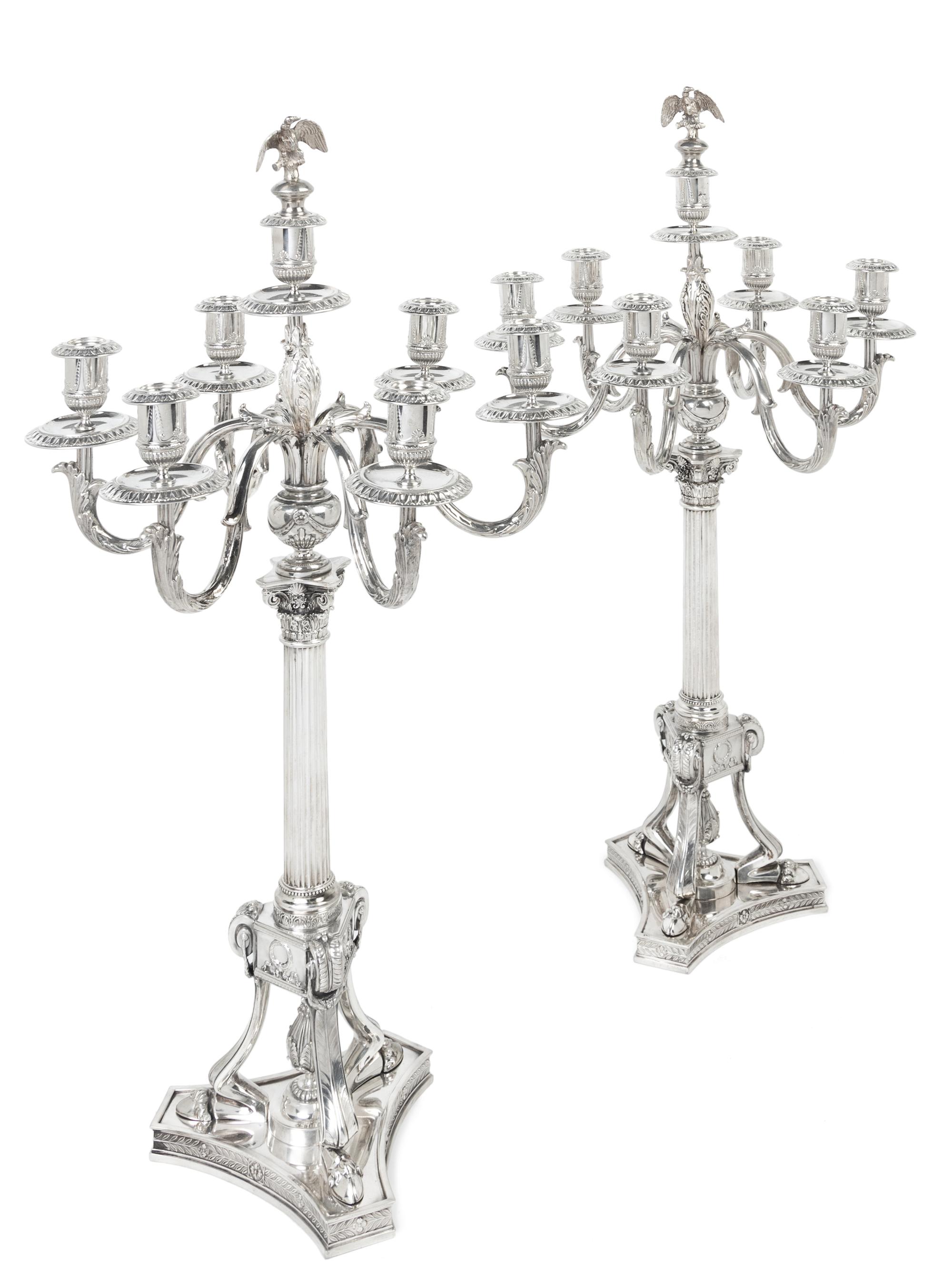 A Pair of German Silver Seven-Light Candelabra, Josef Krischer Nachfolger, Dusseldorf, Early 20th Century, the fluted columnar standard