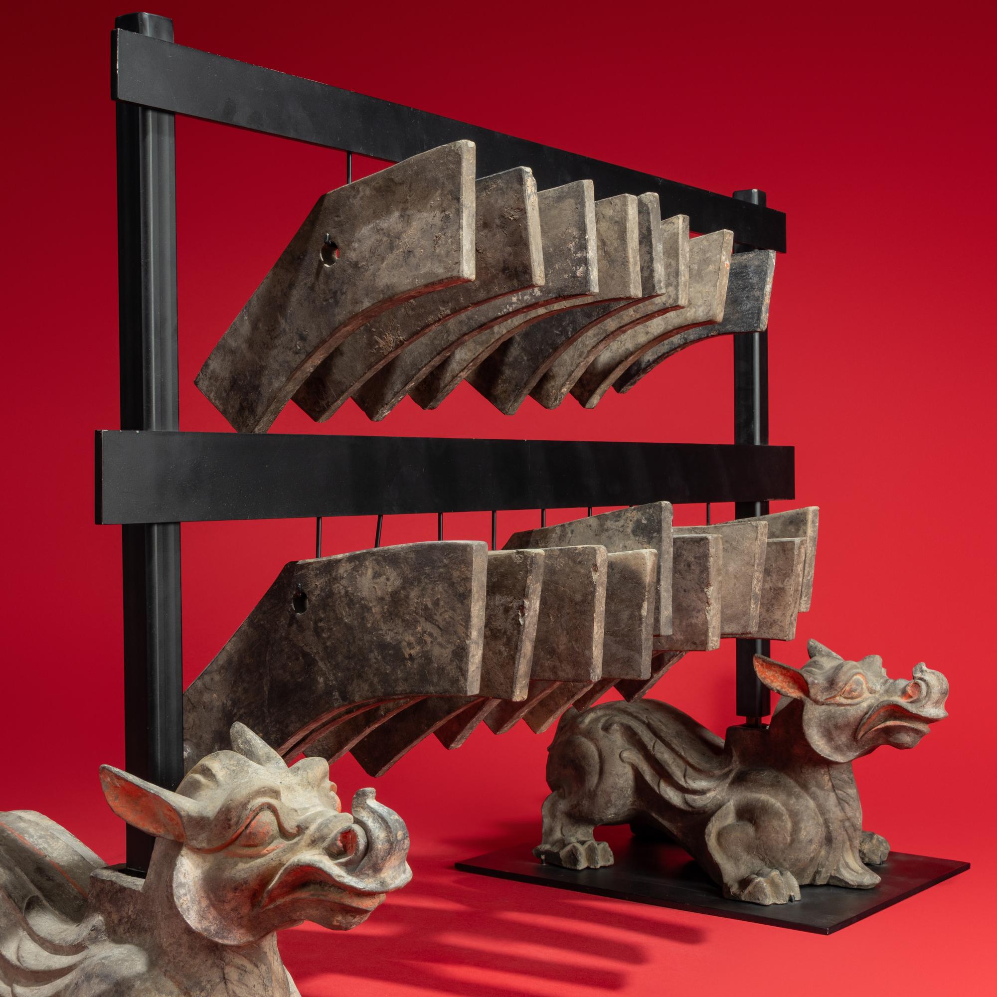 A Rare Chinese Painted Earthenware Chimera and Chimes Set, Qing and Bixie, Western Han Dynasty — 西漢 灰陶編磬一組連辟邪座