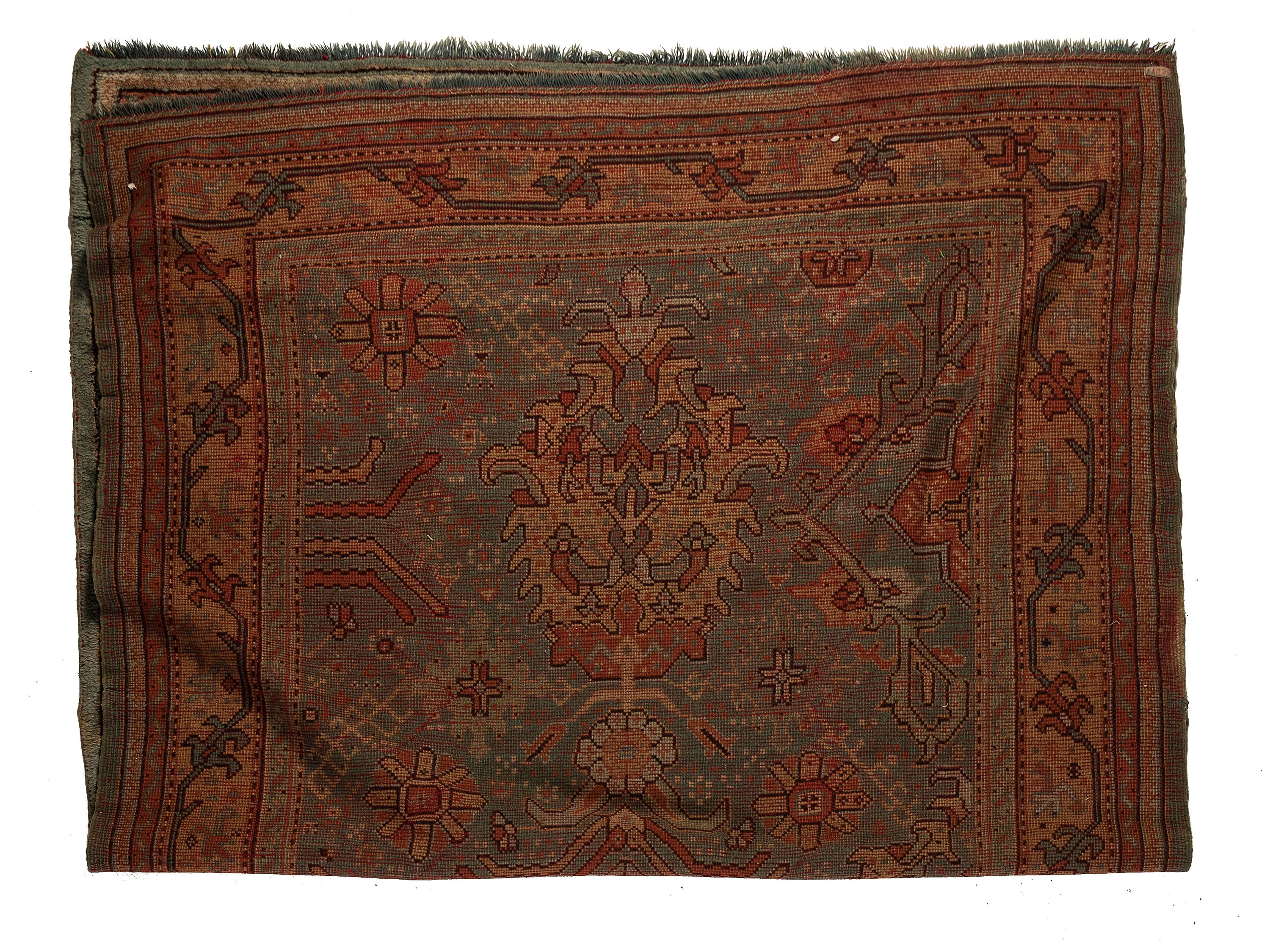 An Oushak Wool Rug