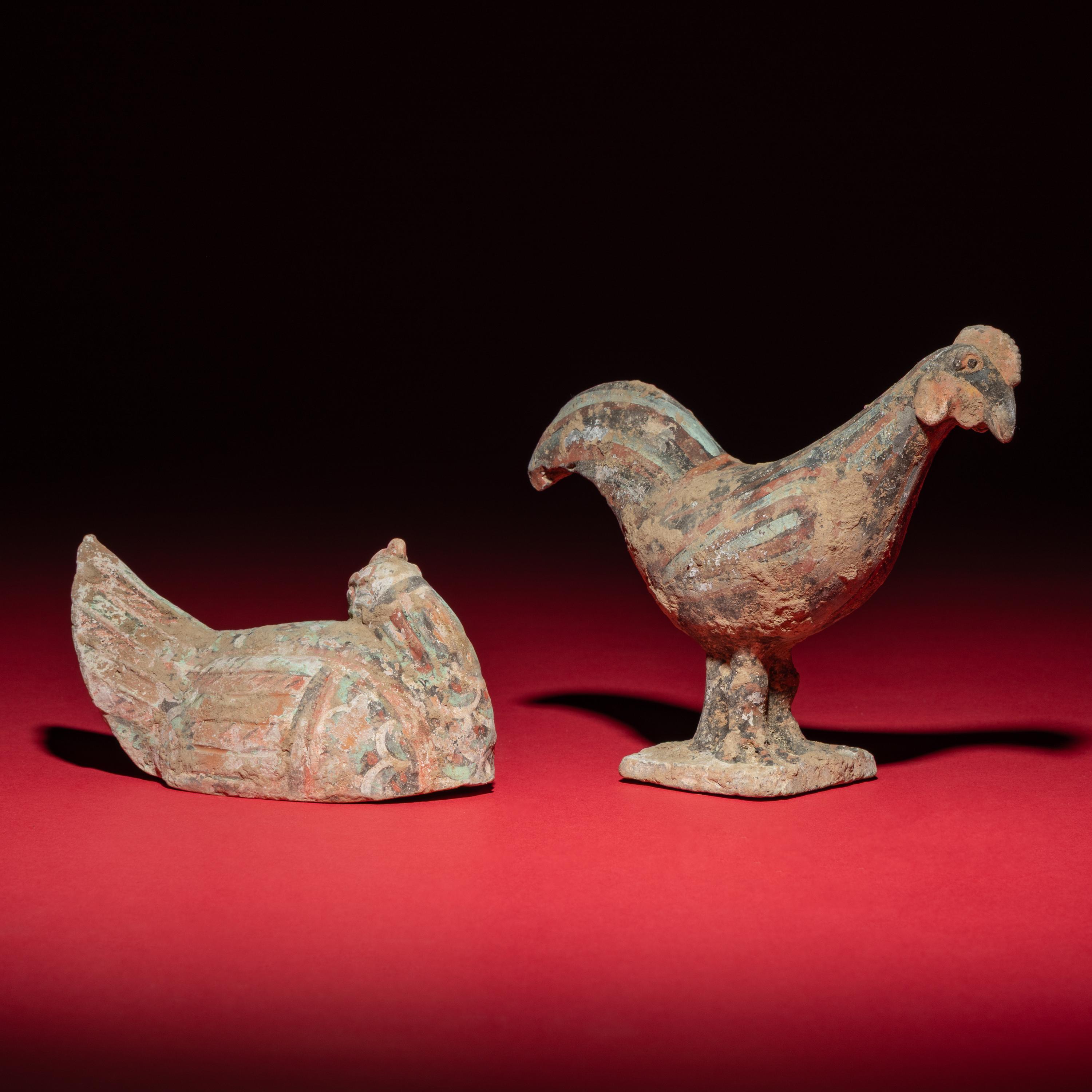 A Chinese Painted Pottery Mandarin Duck and a Cockerel, Han Dynasty — 漢 灰陶彩繪鴛鴦與小公雞
