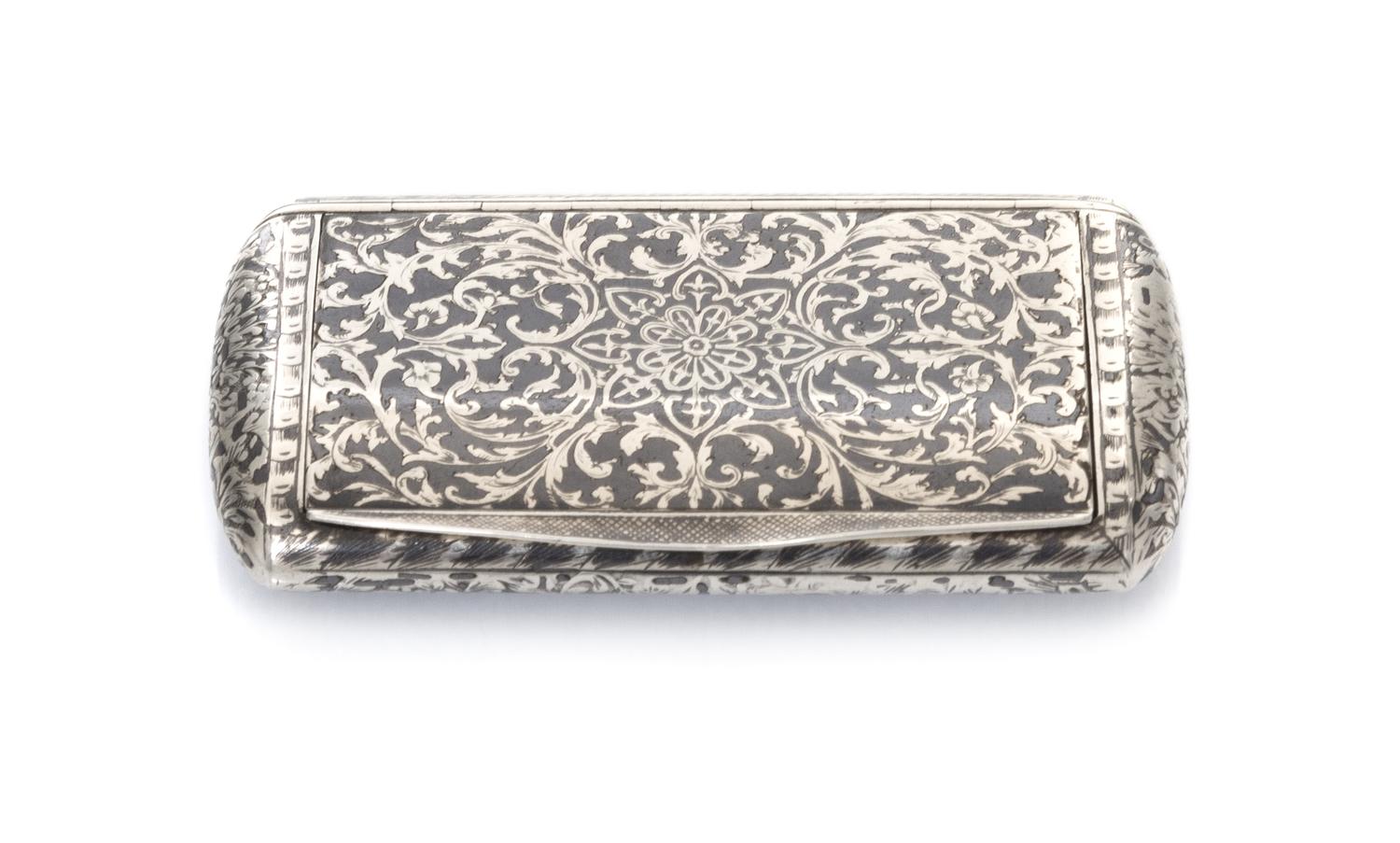 A Continental Niello Silver Cigarette Case, Marks obscured, the case decorated with floral and foliate decoration throughout, the hinge