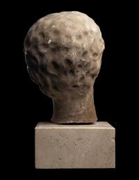 A Roman Marble Head of a Woman