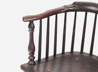 A black-painted Windsor bench, late 18th century