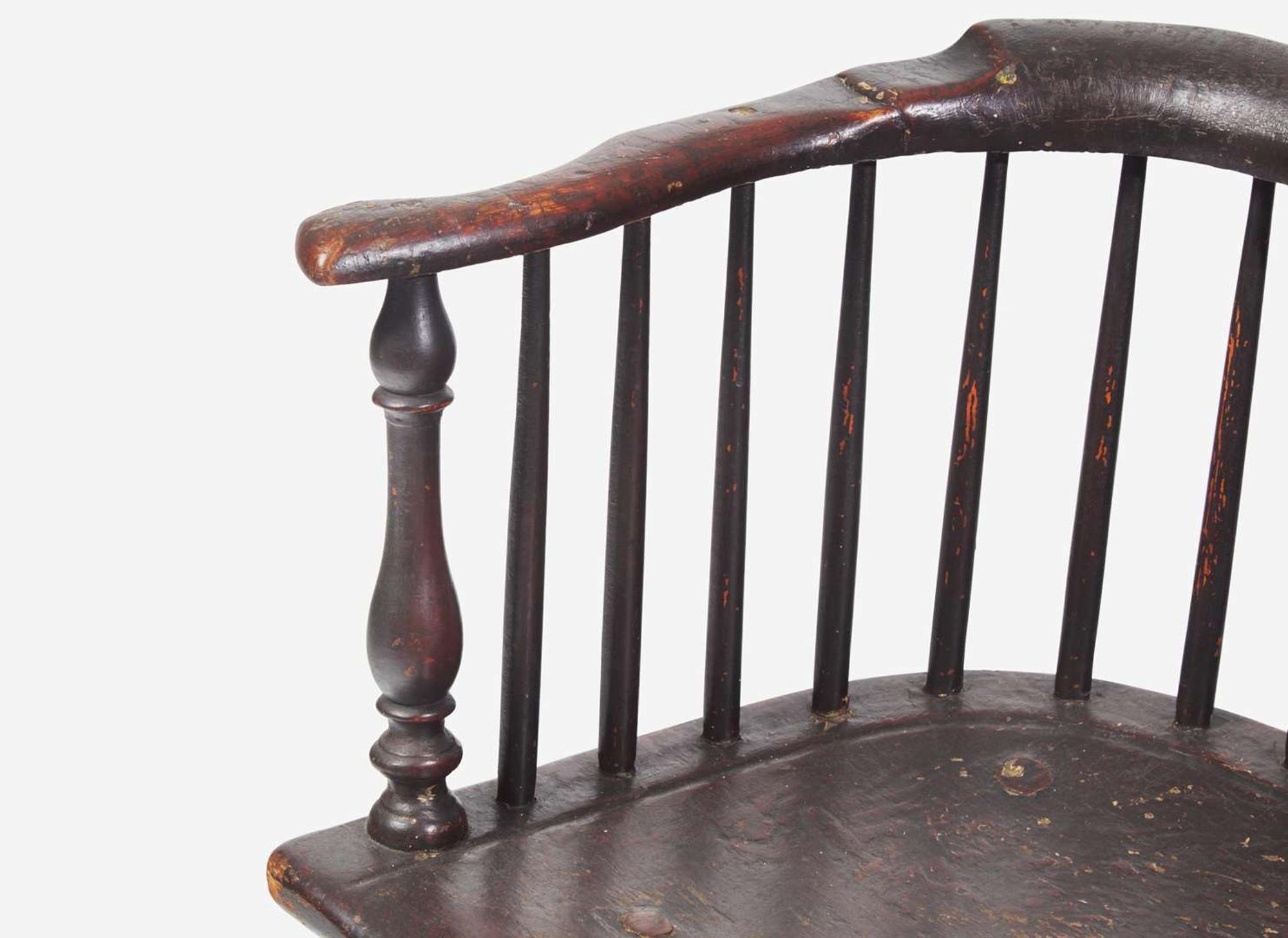 A black-painted Windsor bench, late 18th century
