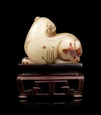 A Carved Jade Figure of a Beast