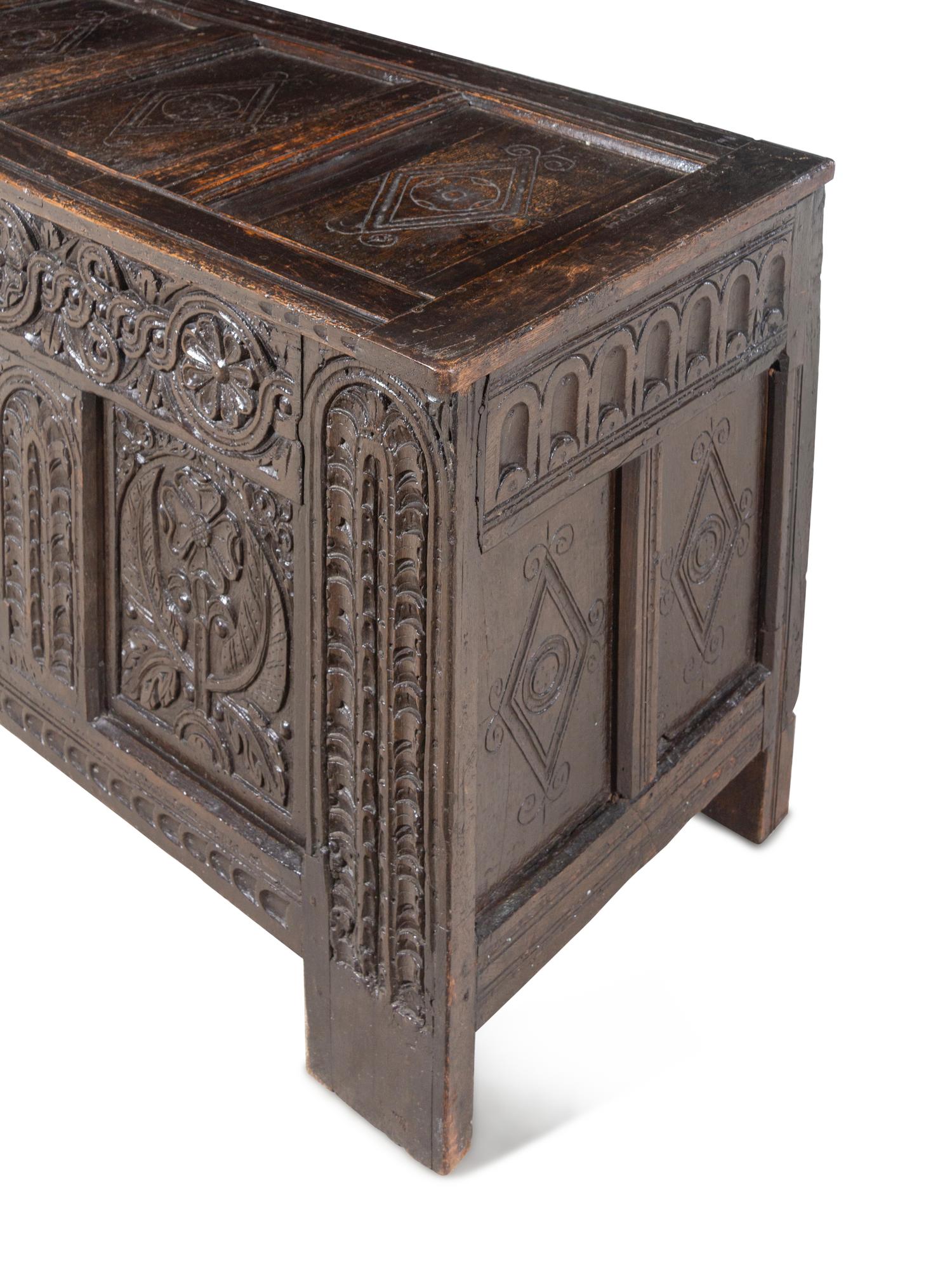 A Charles II Style Carved Oak Coffer