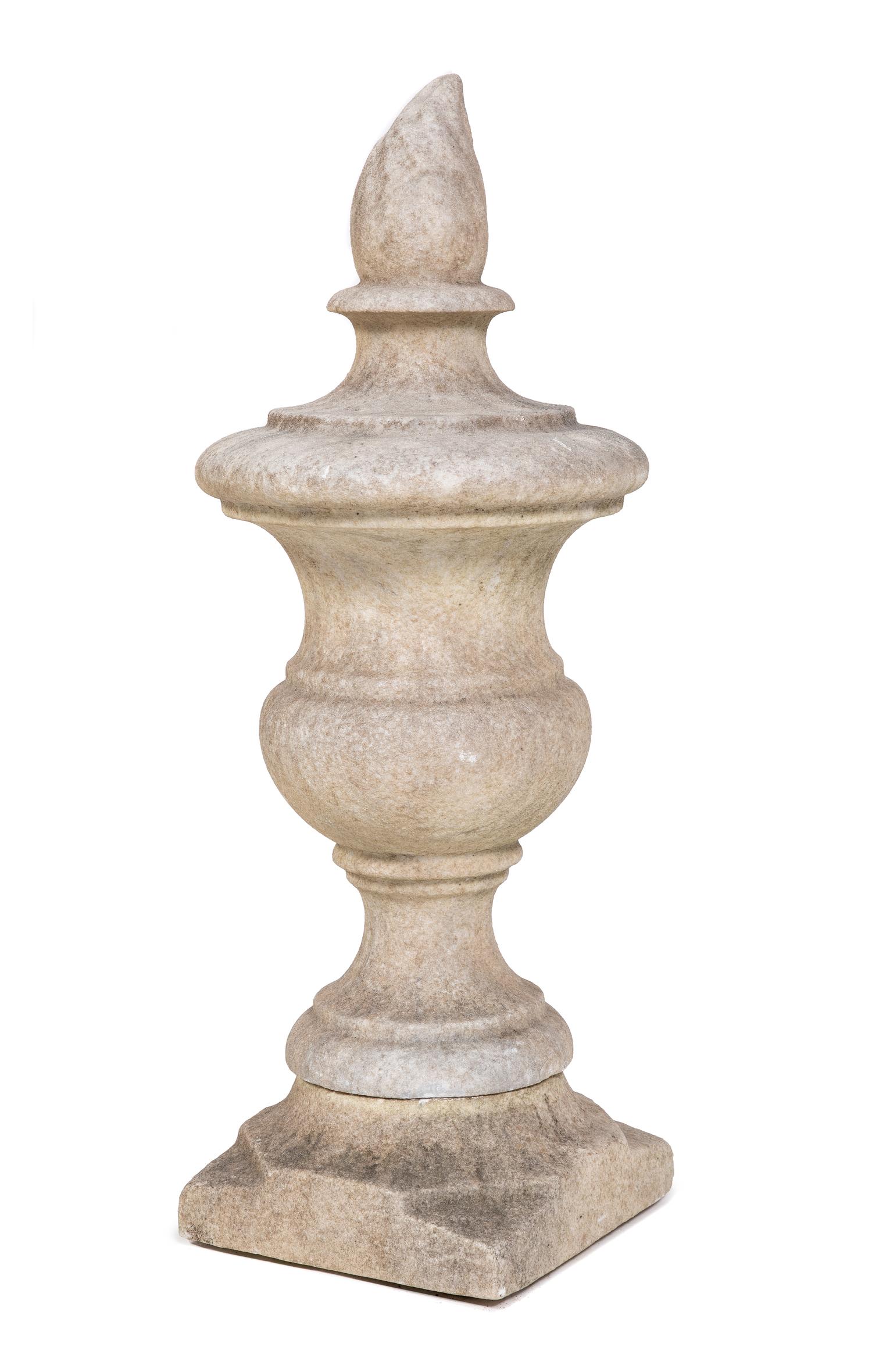 A Carved Stone Flaming Urn Finial