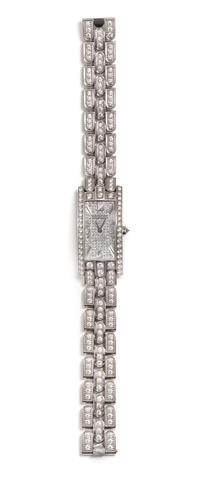 An 18 Karat White Gold and Diamond "Avenue" Wristwatch, Harry Winston, 64.40 dwts.