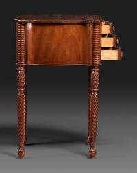 A Classical Carved Mahogany Three Drawer Work Table