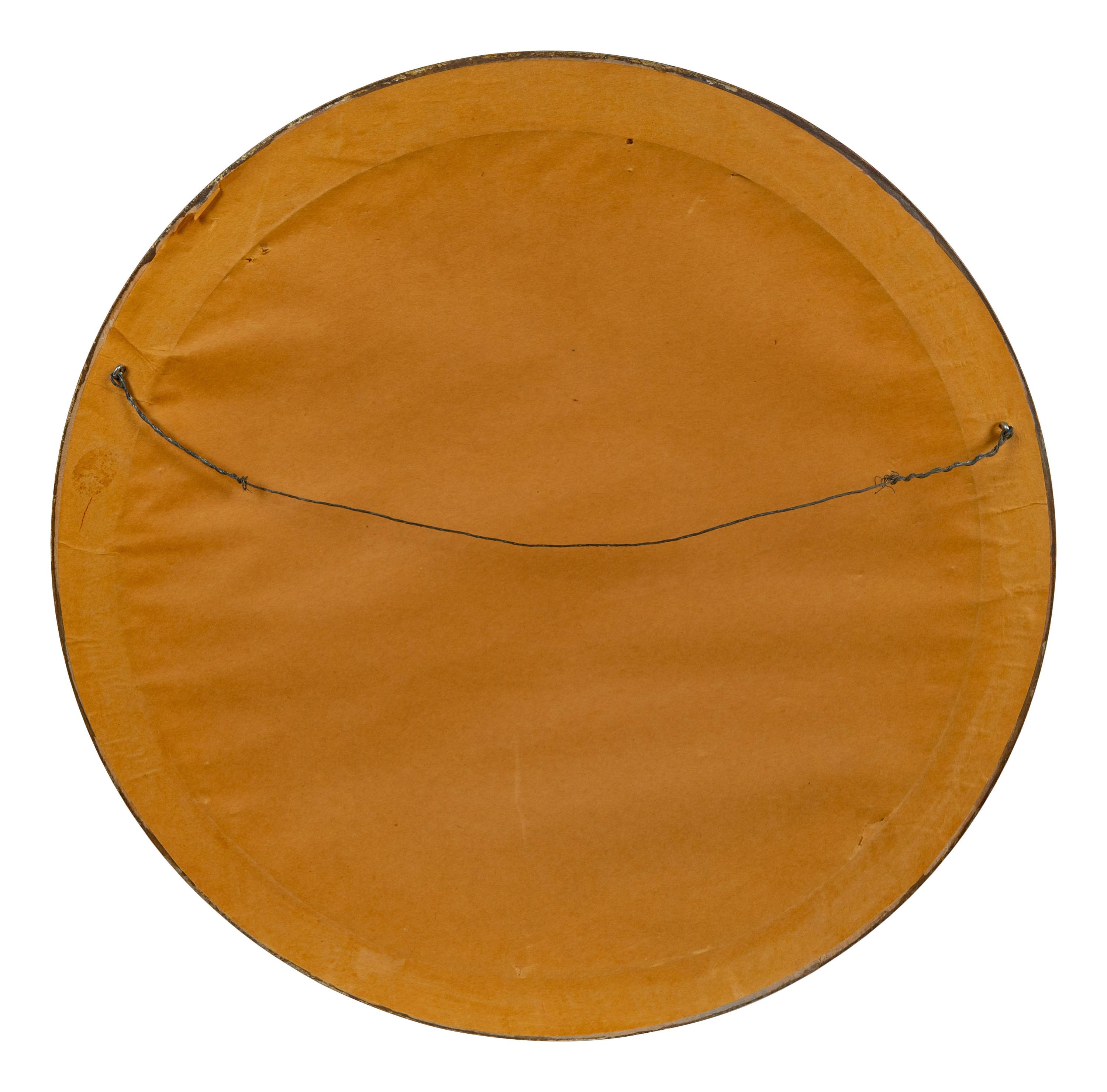 A Chinese Framed Blue Ground Embroidered Silk Panel Diameter 13 1/2 inches.
