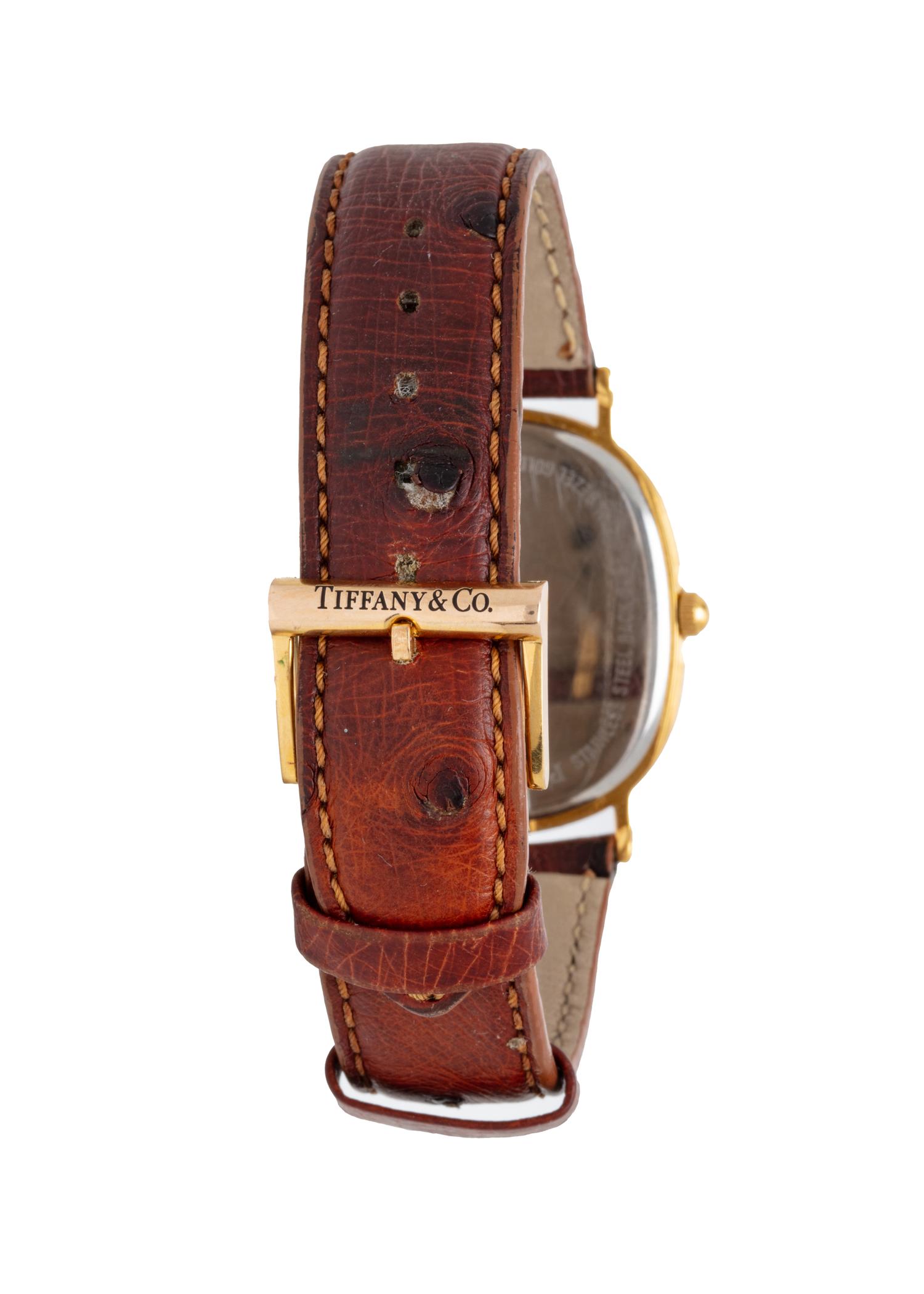 TIFFANY & CO., TWO STAINLESS STEEL WATCHES WITH EXOTIC LEATHER STRAPS