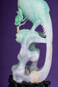 A Pair of Semi-Translucent Green Jadeite Figures of Phoenix