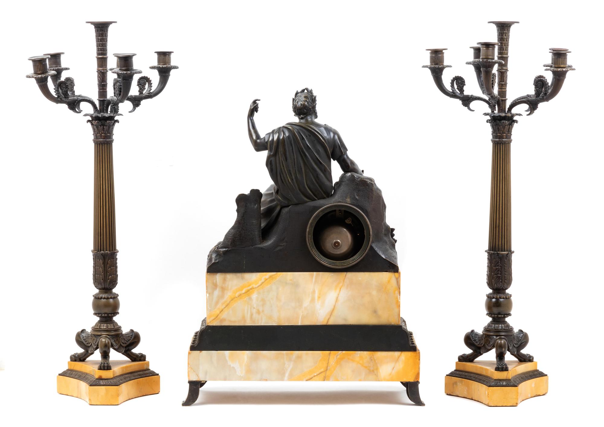A Neoclassical Style Gilt and Patinated Bronze and Sienna Marble Clock Garniture