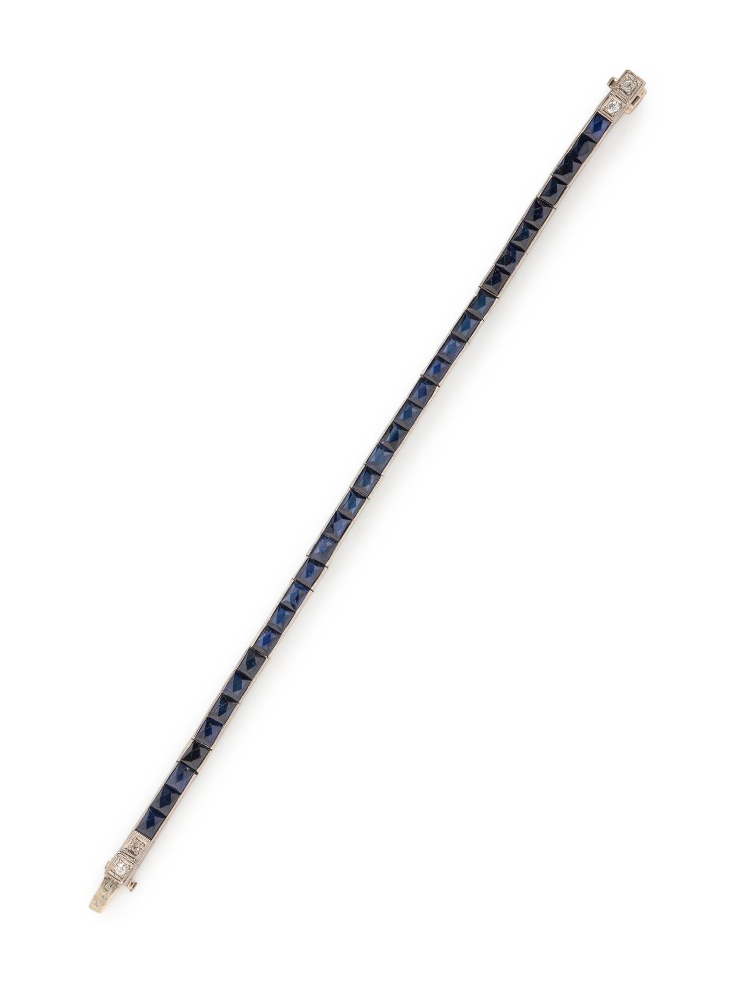 ART DECO, PLATINUM, SYNTHETIC SAPPHIRE, AND DIAMOND LINE BRACELET