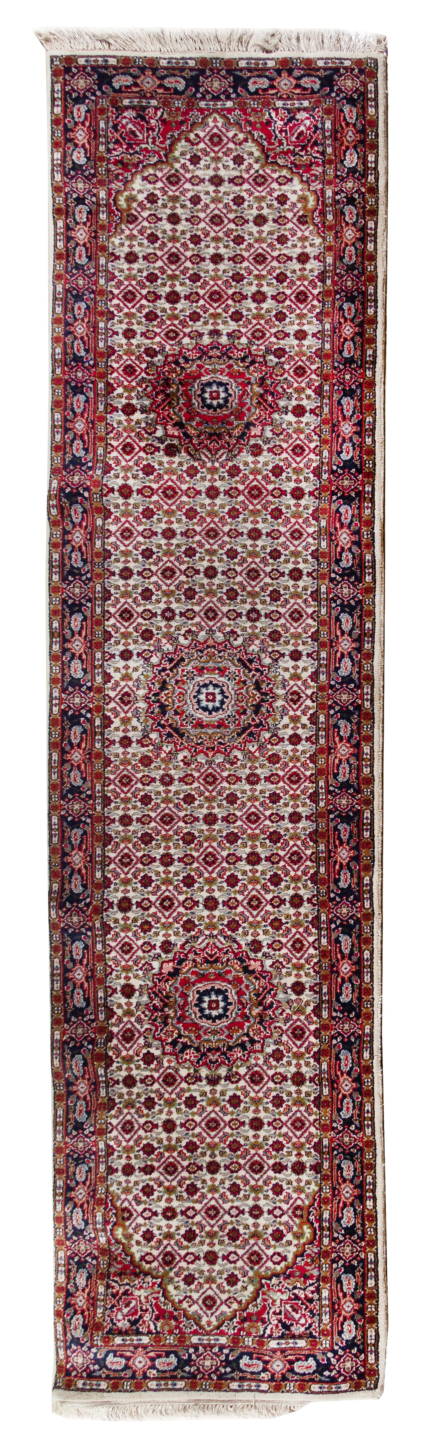 A Indo-Bidjar Wool Runner 10 feet 5 1/2 inches x 2 feet 8 inches.