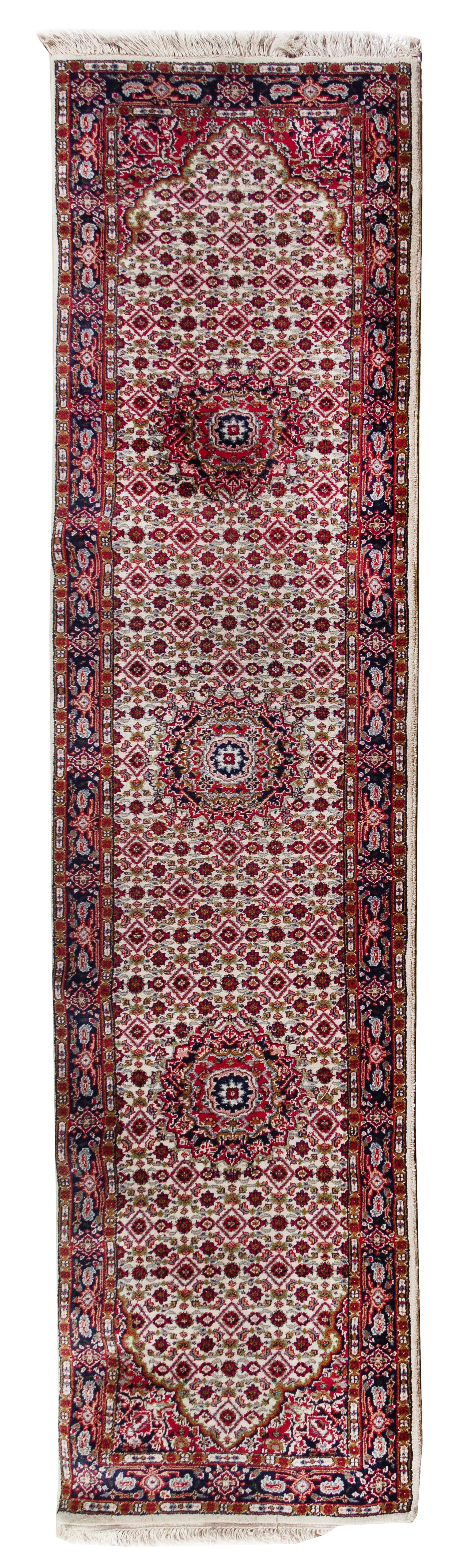 A Indo-Bidjar Wool Runner 10 feet 5 1/2 inches x 2 feet 8 inches.