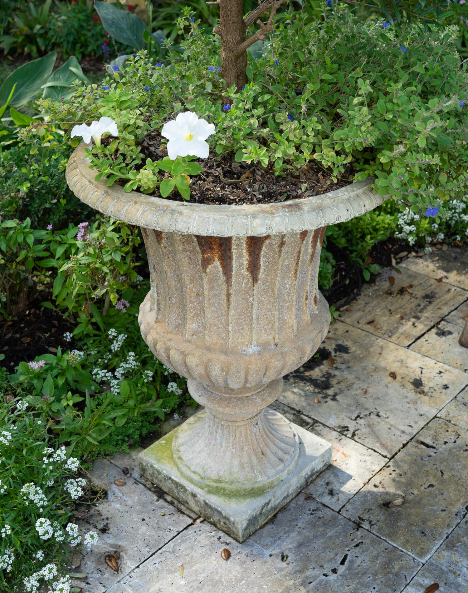 Four Campana Form Painted Iron Jardinieres on Plinth Bases