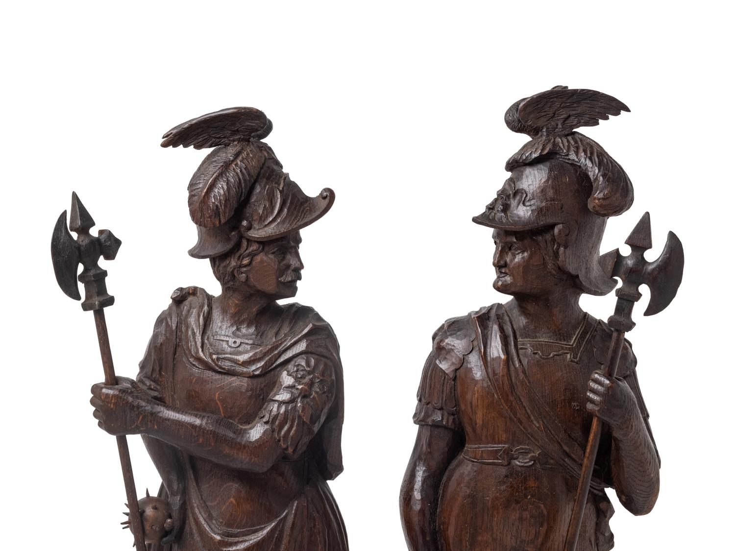 A Pair of Continental Carved Oak Figures of Knights