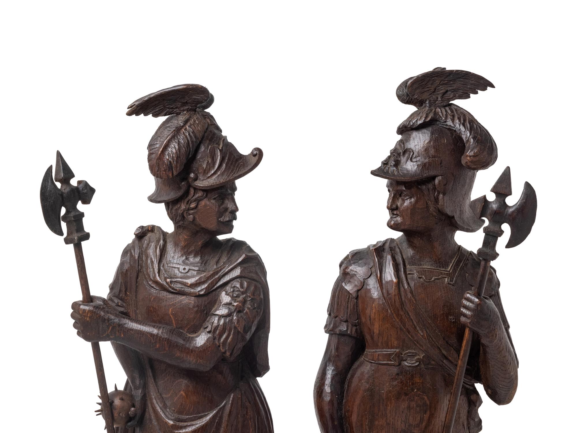 A Pair of Continental Carved Oak Figures of Knights