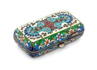 A Russian Enameled Silver and Plique-a-Jour Cigarette Case, , the lid and underside with floral and foliate decoration, the sides with