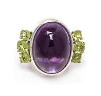 A Silver, Amethyst and Peridot Ring, 17.95 dwts.