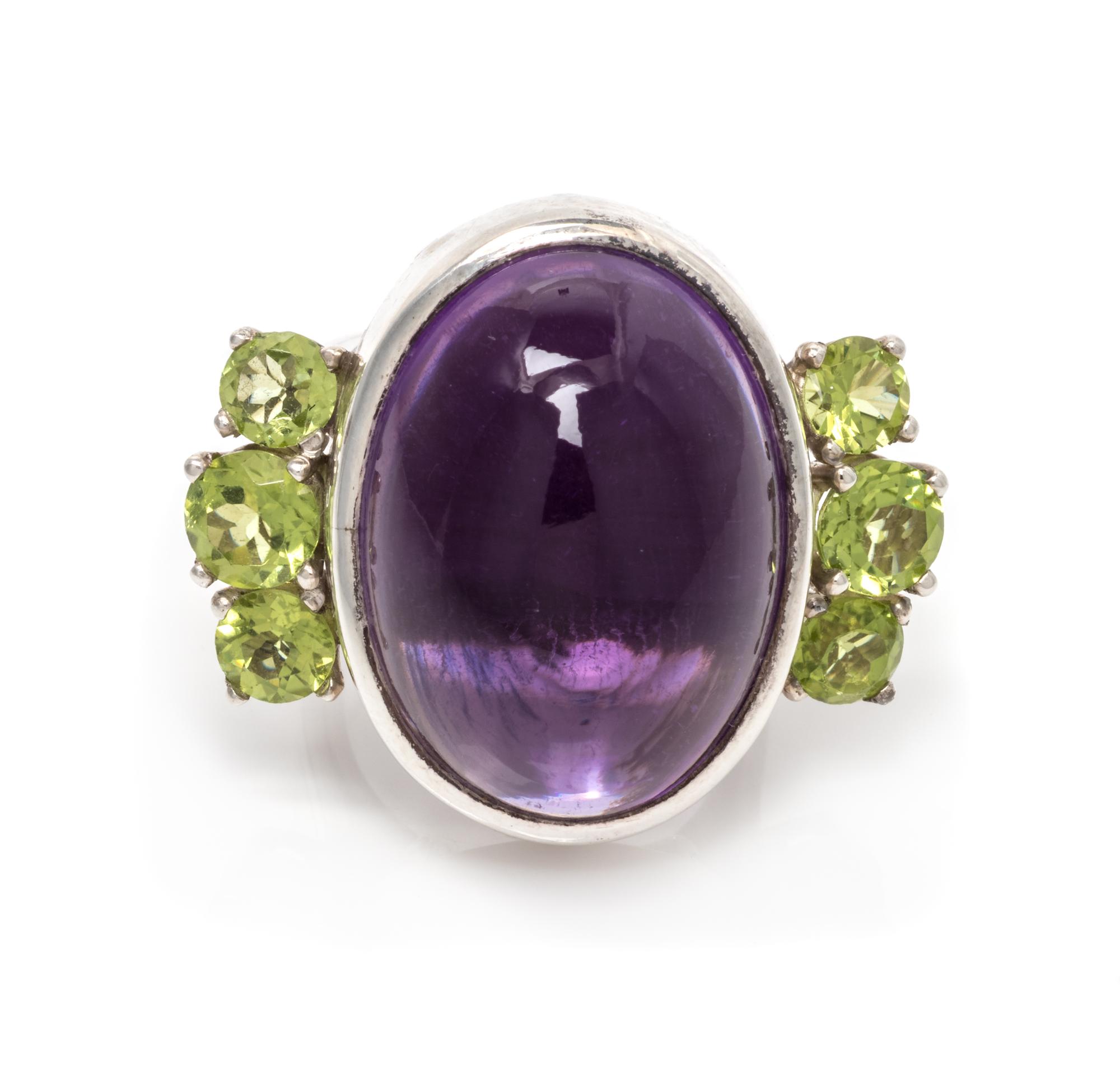 A Silver, Amethyst and Peridot Ring, 17.95 dwts.