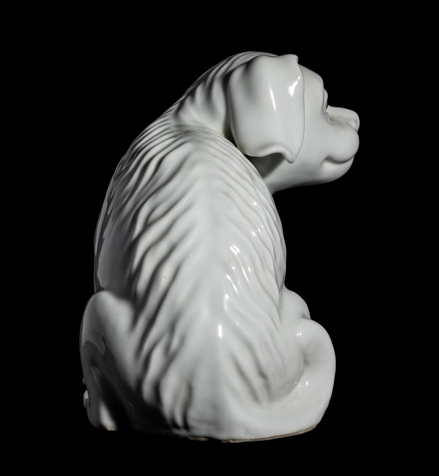 A Japanese Hirado White Glazed Porcelain Figure of a Puppy