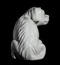 A Japanese Hirado White Glazed Porcelain Figure of a Puppy