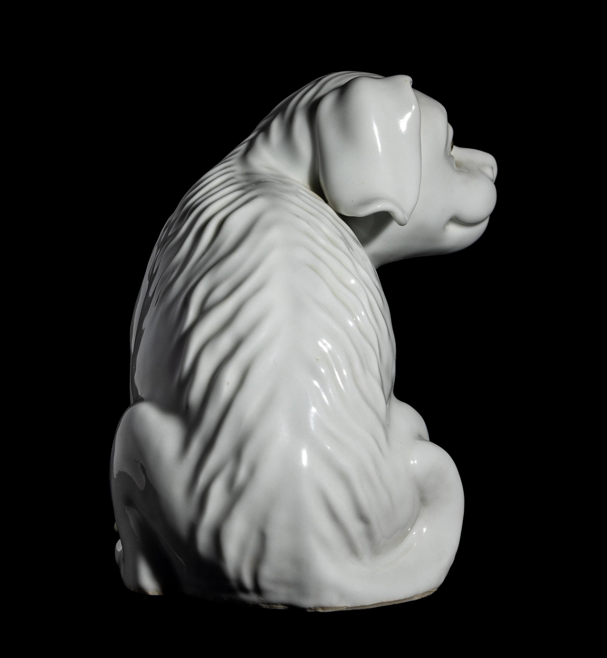 A Japanese Hirado White Glazed Porcelain Figure of a Puppy