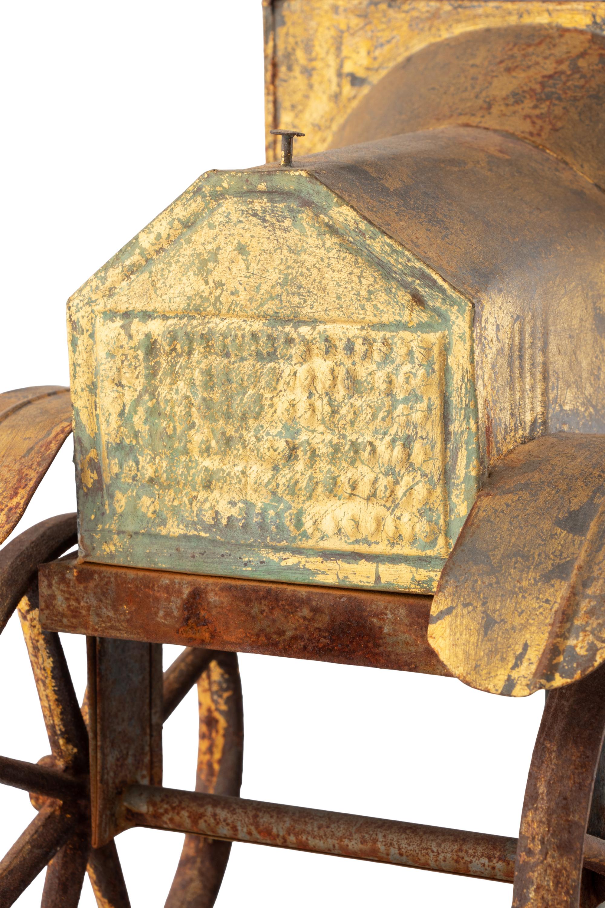 A Gilt, Cut, and Pressed Sheet Metal Automobile Weathervane