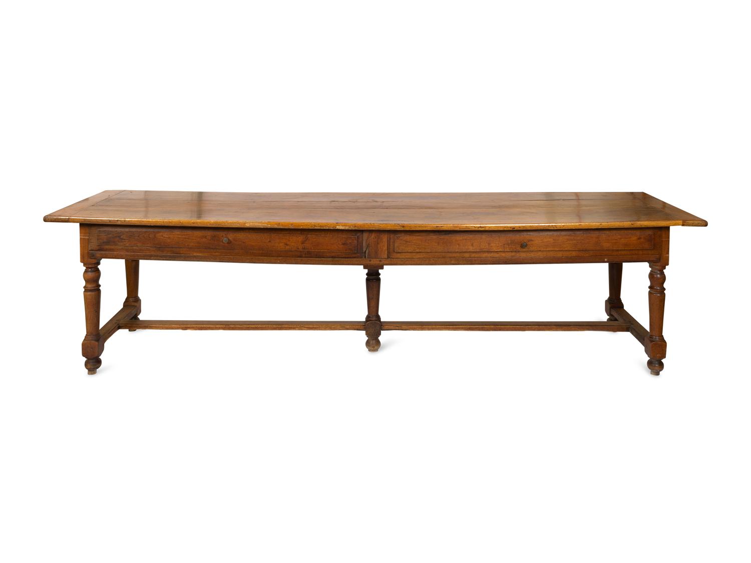 A Large Continental Fruitwood Refectory Table