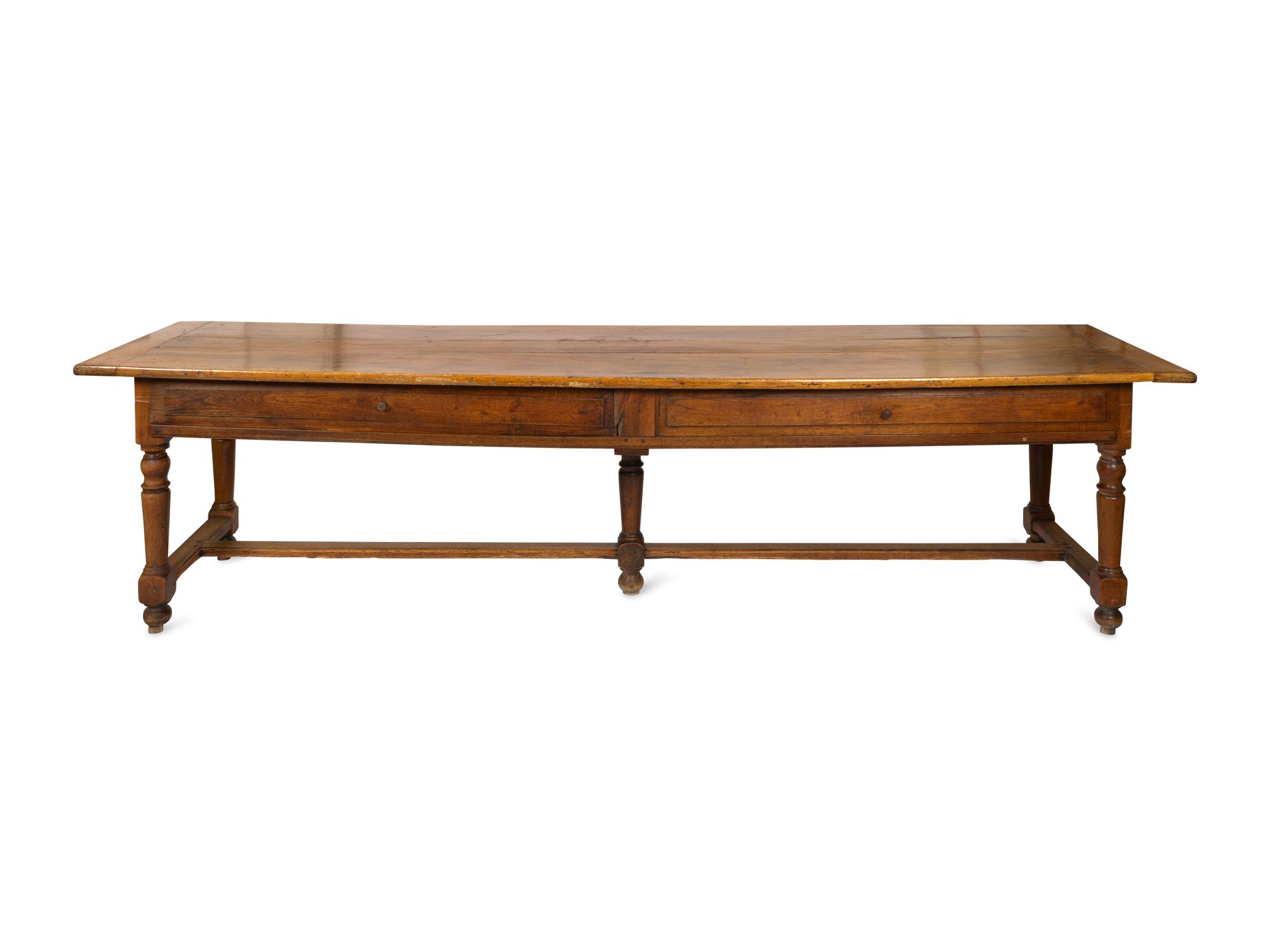 A Large Continental Fruitwood Refectory Table