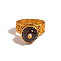 A Byzantine Garnet and Gold Domed Finger Ring