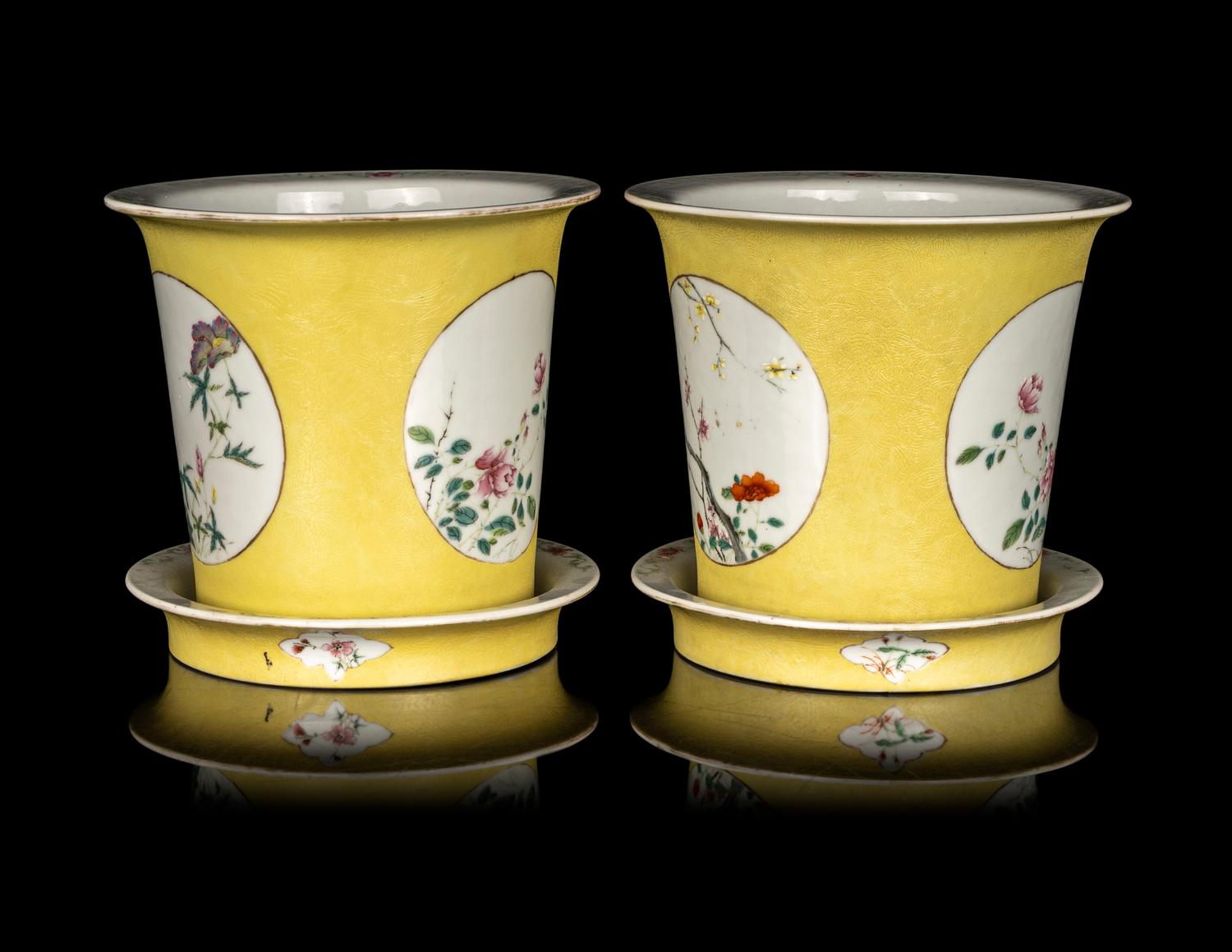 A Pair of Chinese Yellow Ground Famille Rose Cache Pots and Undertrays